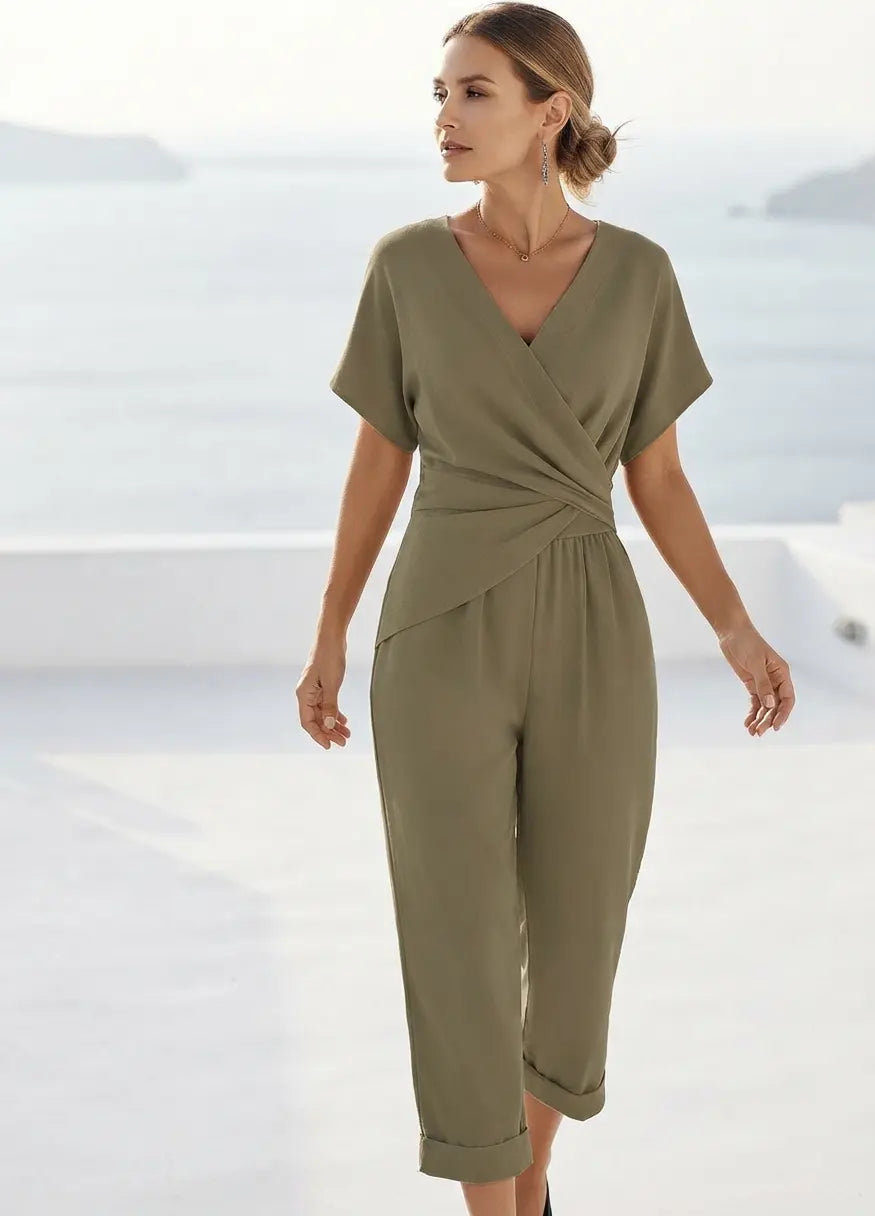 Women's dusty blue two-piece set with wrap V-neck top and cuffed cropped trousers, front view