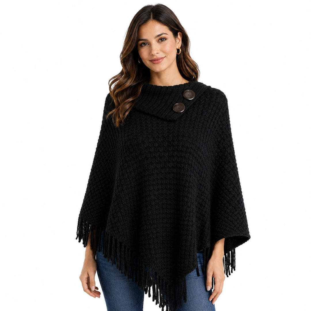 Close-up of ribbed cowl neckline with two decorative black buttons on fringe poncho
