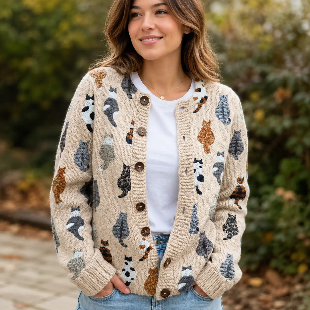 Beige cat print cardigan with round neckline and button closure, front view