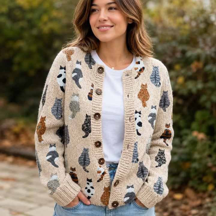 Beige cat print cardigan with round neckline and button closure, front view