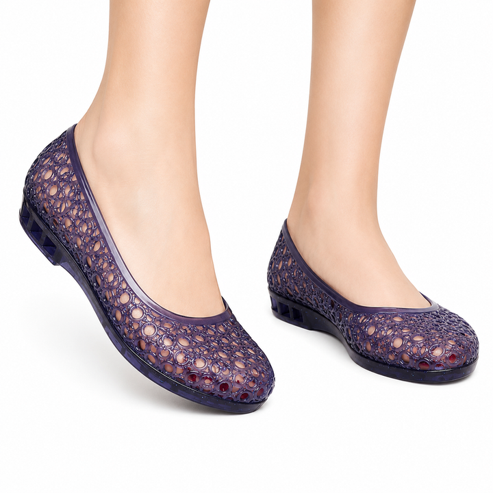 Women's gray-blue jelly flat slip-on shoe with bubble cutout lattice pattern, flat-lay view