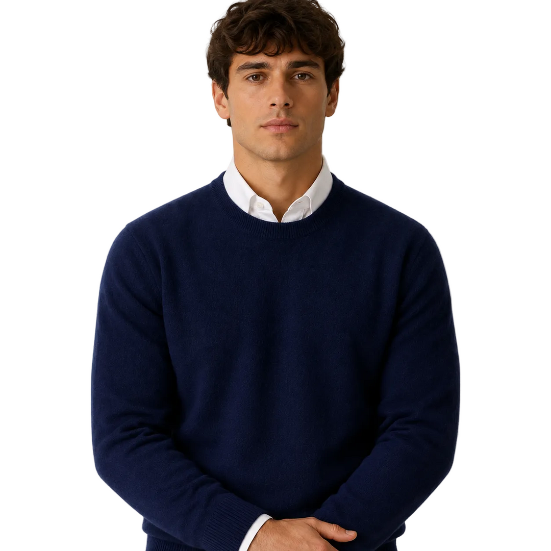 Men's navy V-neck pullover sweater worn over a white dress shirt, front view