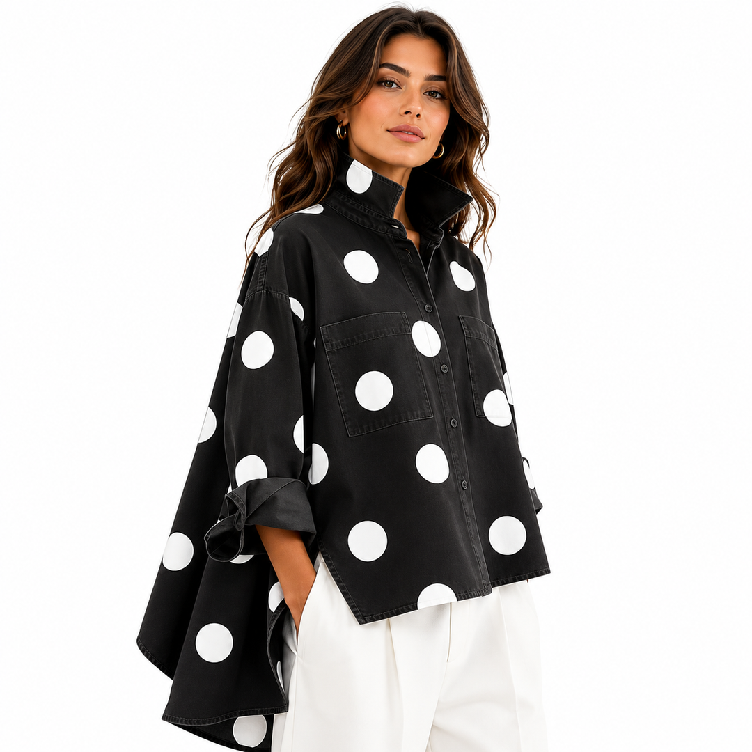 Polka dot shirt with rollable cuffed sleeves and button flap chest pockets, side view