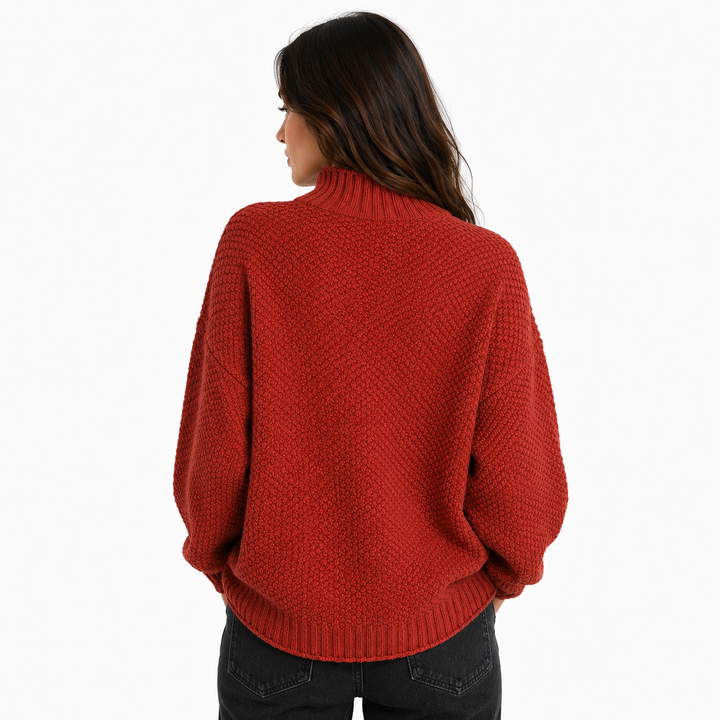 Oversized mock neck knit sweater, side view showing hip length