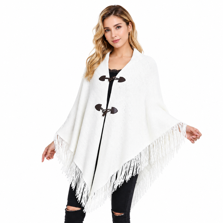 Solid-color tassel shawl cloak with horn toggle buttons, flat lay