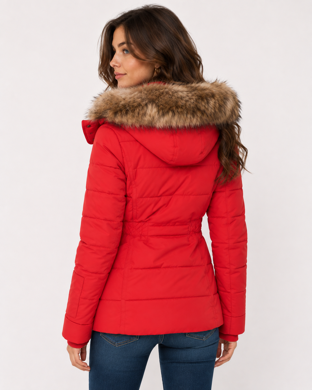 Women's insulated parka with fitted waist and faux fur hood, side view