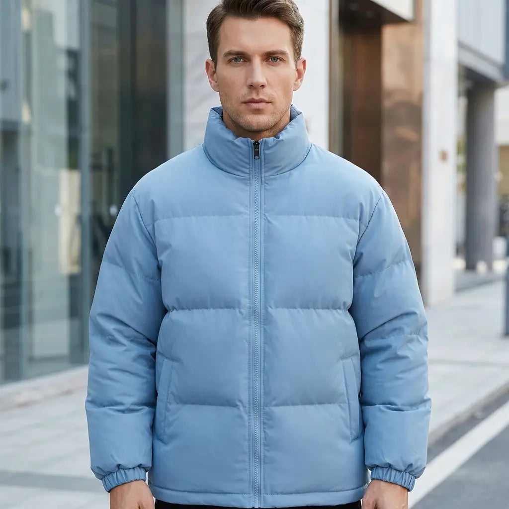 Men's quilted puffer jacket in light blue, stand collar and zip, front view