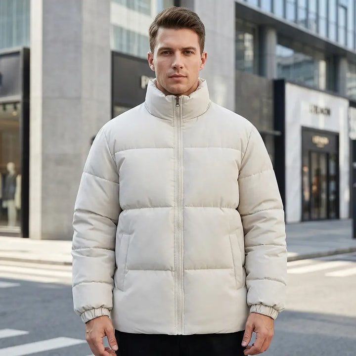 Men's quilted puffer jacket in light khaki, stand collar and zip, front view
