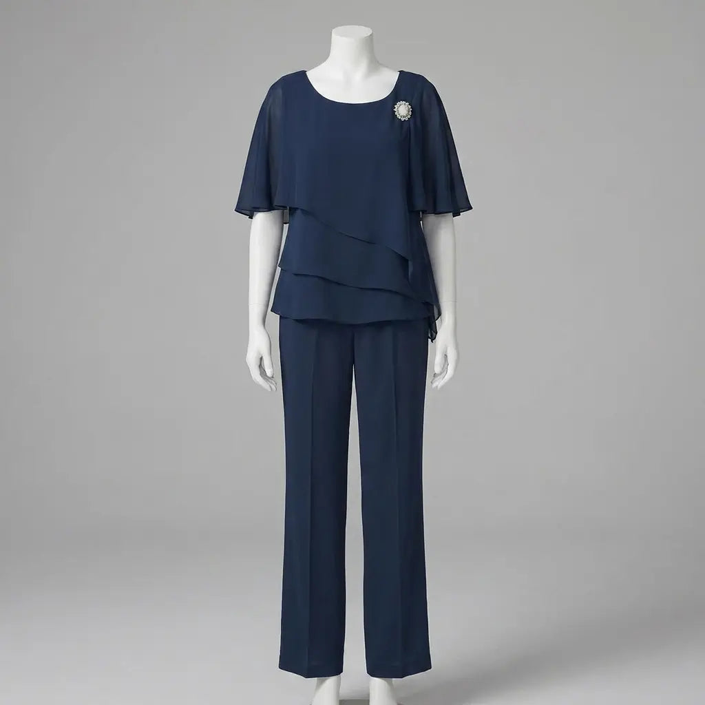 Navy blue asymmetric layered top and straight-leg trousers on mannequin, front view