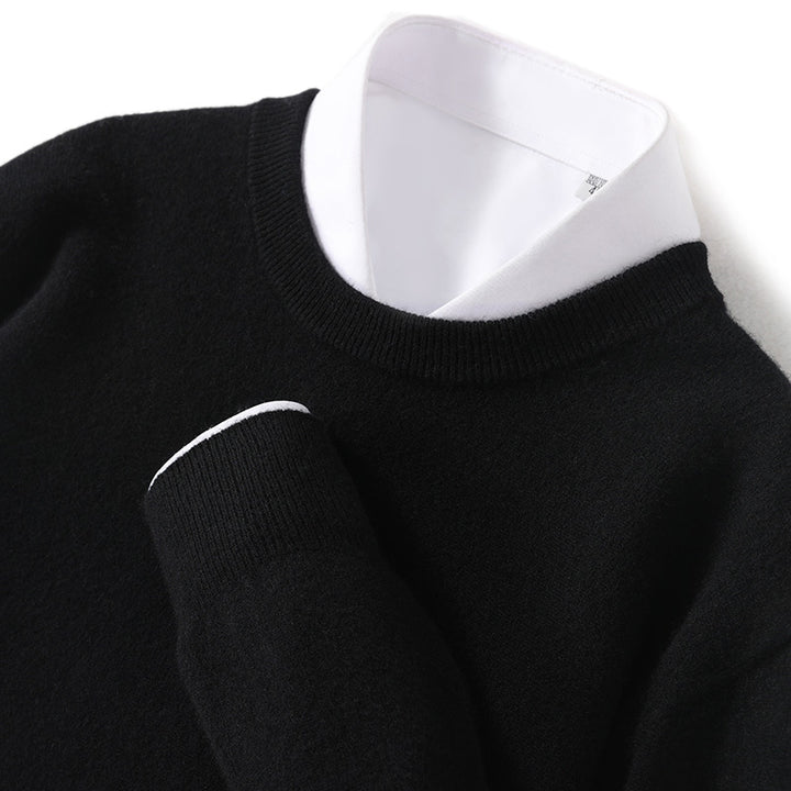 Close-up of ribbed V-neckline and fine-knit texture on men's pullover sweater