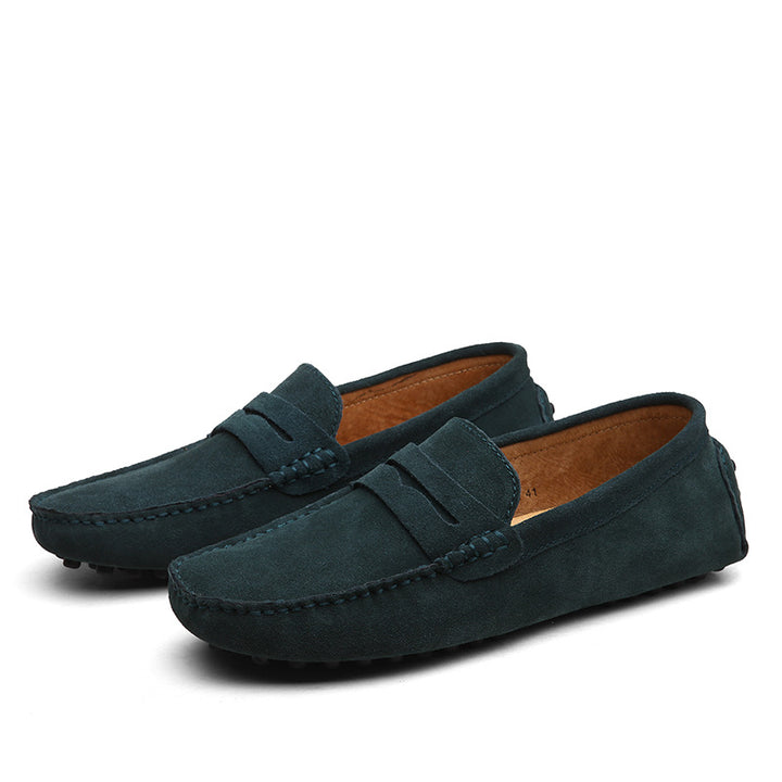Men's suede penny loafers, moc toe and suede upper, three-quarter view