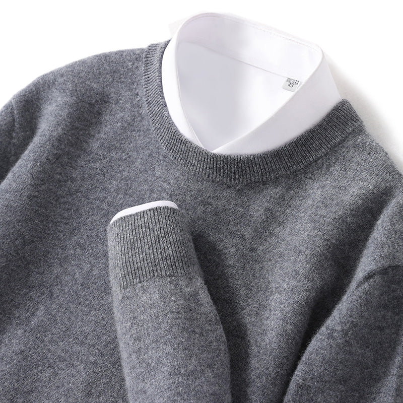 Men's V-neck wool sweater side view showing ribbed cuffs and hem