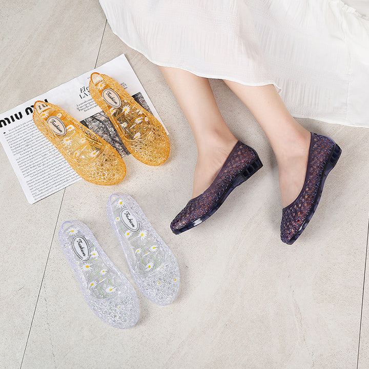 Women's jelly flat slip-on shoes with round bubble cutout upper, flat-lay view