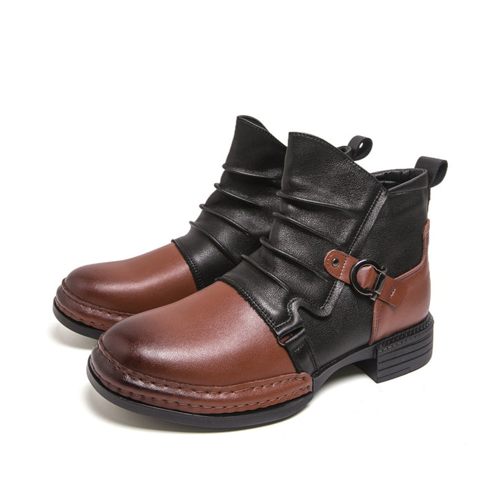 Men's zip-up ankle boots brown toe cap black upper flat lay