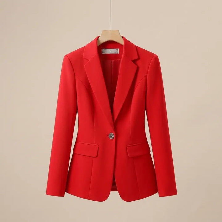 Red tailored blazer with notched lapel and single button on hanger, product view