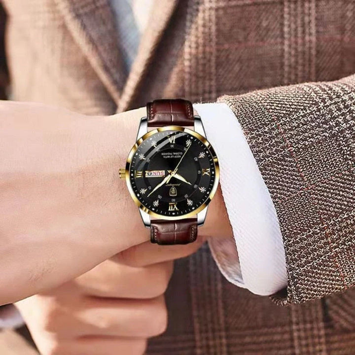 Close-up of a wrist wearing a watch with a brown leather strap and black dial.