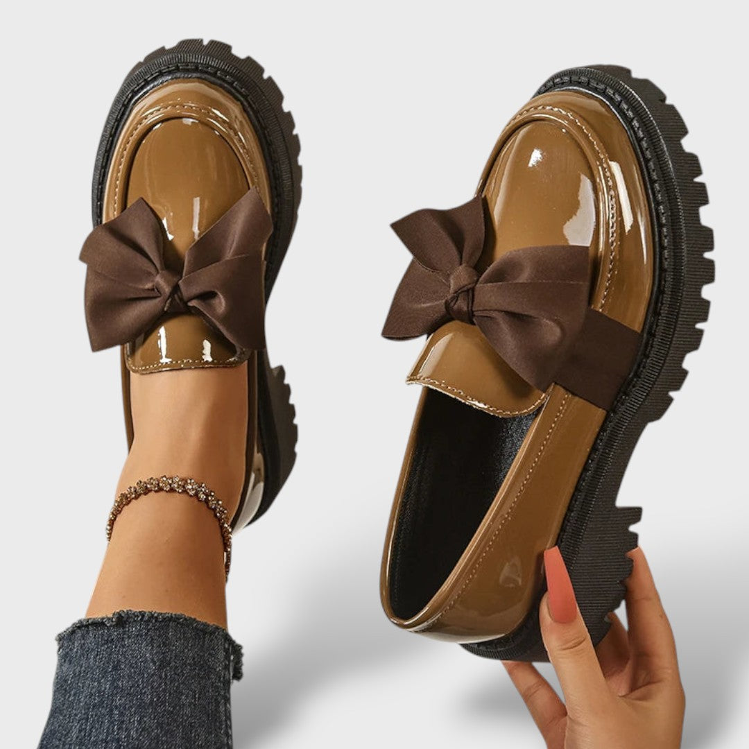 Camel patent leather platform loafers with dark brown bow, top and side view