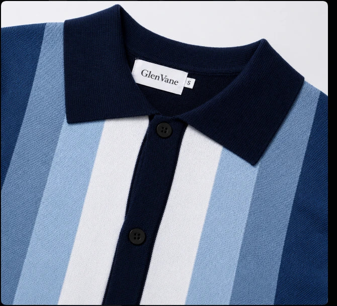 Close-up of striped knit polo collar and button placket in navy and blue