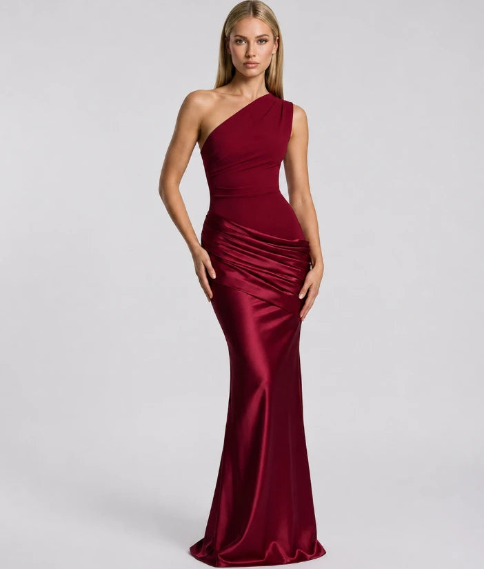 Women's one-shoulder maxi dress on model, side profile view