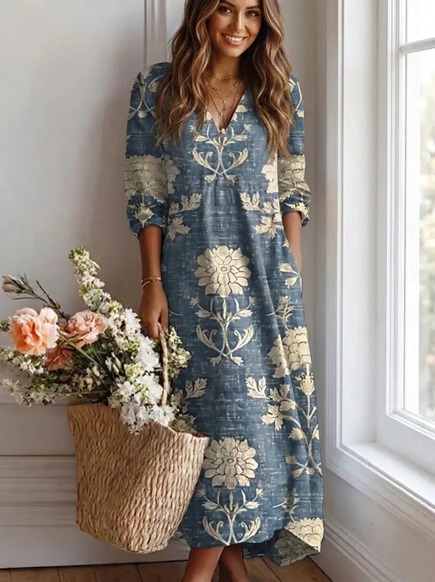 Floral midi dress in dusty blue with V-neck and 3/4 sleeves, front view