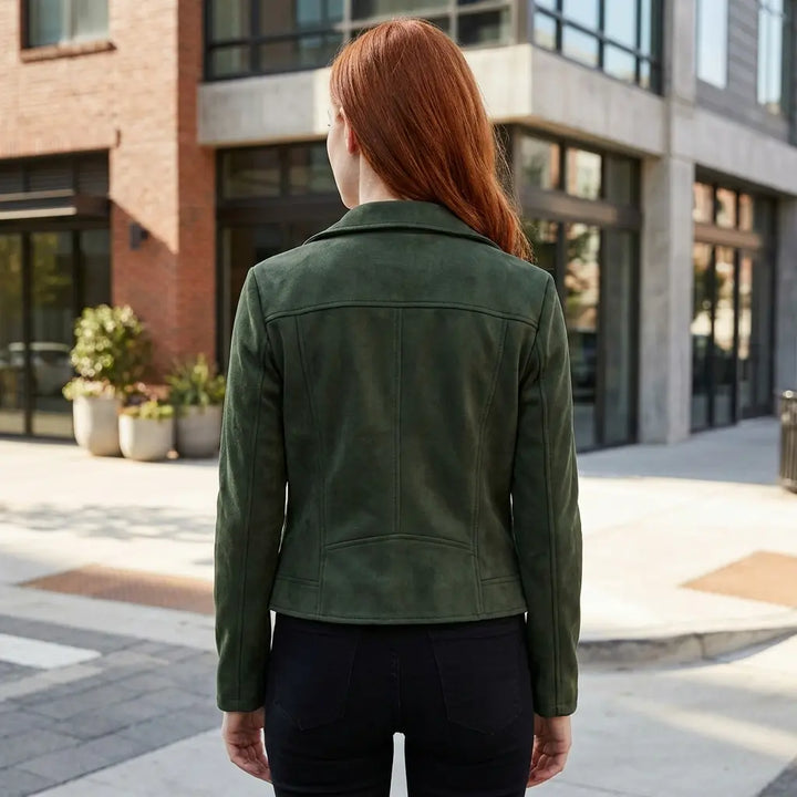 Women's faux leather moto jacket back view showing slim fit and seamed panels