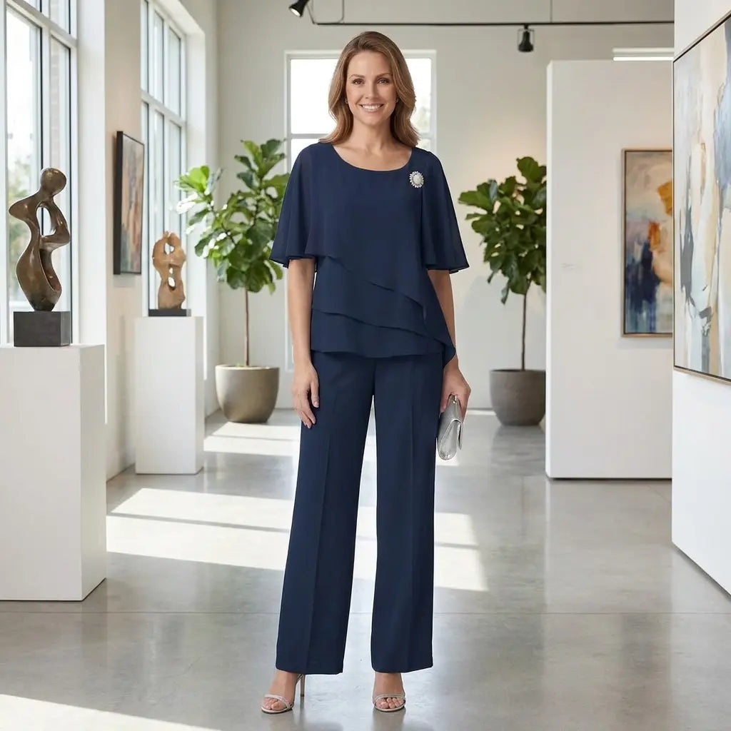 Navy blue layered flutter-sleeve top and straight-leg trousers set, front view