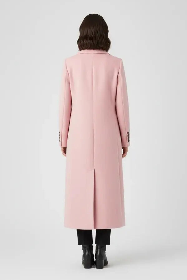 Light pink long coat back view showing center vent and button cuffs