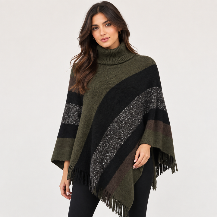 Striped turtleneck poncho sweater flat lay, fringe hem detail