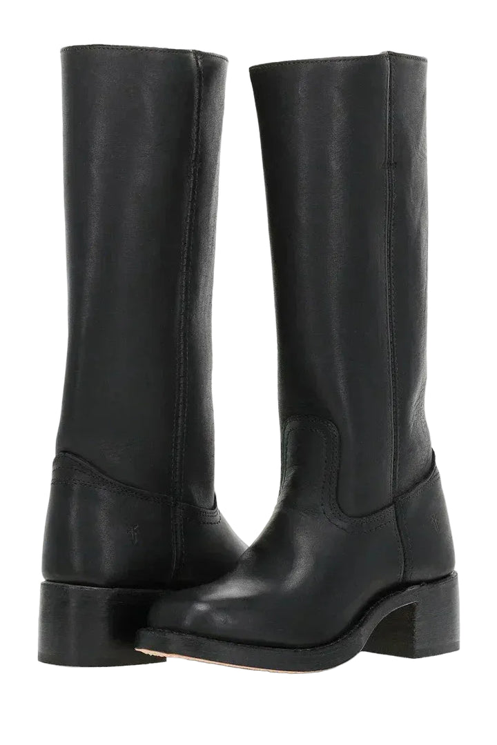 Close-up detail of mid-calf Western boots with contrast stitching