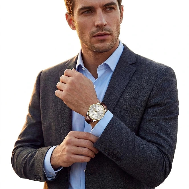 Classic stainless steel dress watch on male model, formal occasion