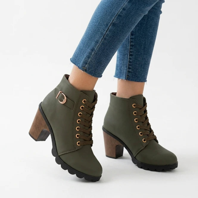 Black lace-up ankle boots styled for autumn casual look