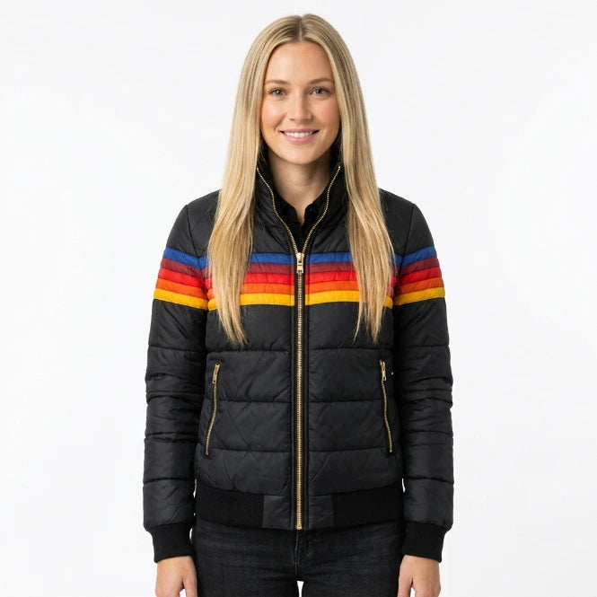 Women's quilted puffer jacket with hood, side view showing hip-length fit