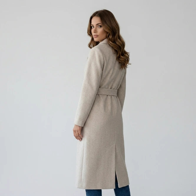 Women's long double-breasted belted coat in cream, back view on model