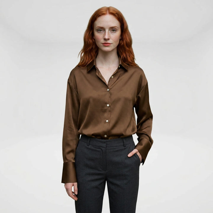 Women's brown satin button-up blouse, model front view
