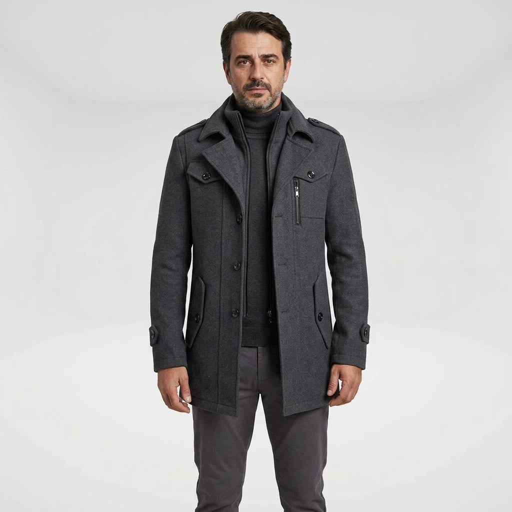 Man wearing gray men's winter overcoat — front view, mid-thigh length