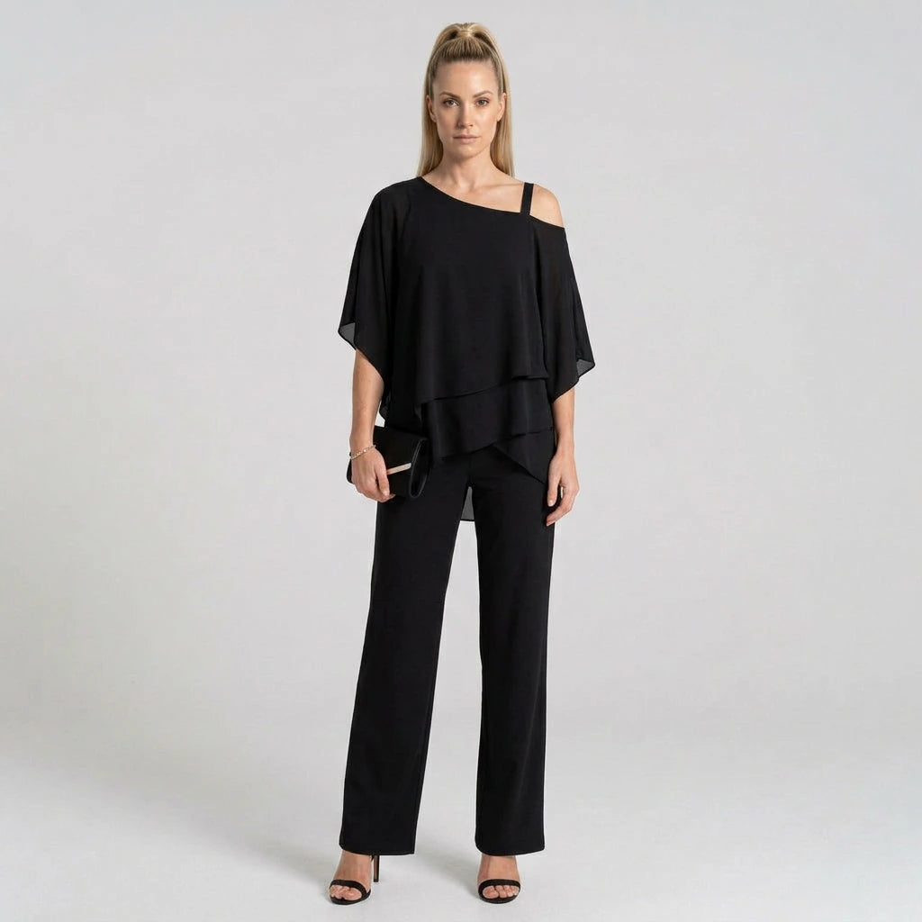 Women's black chiffon layered top and wide-leg pants set, model front view