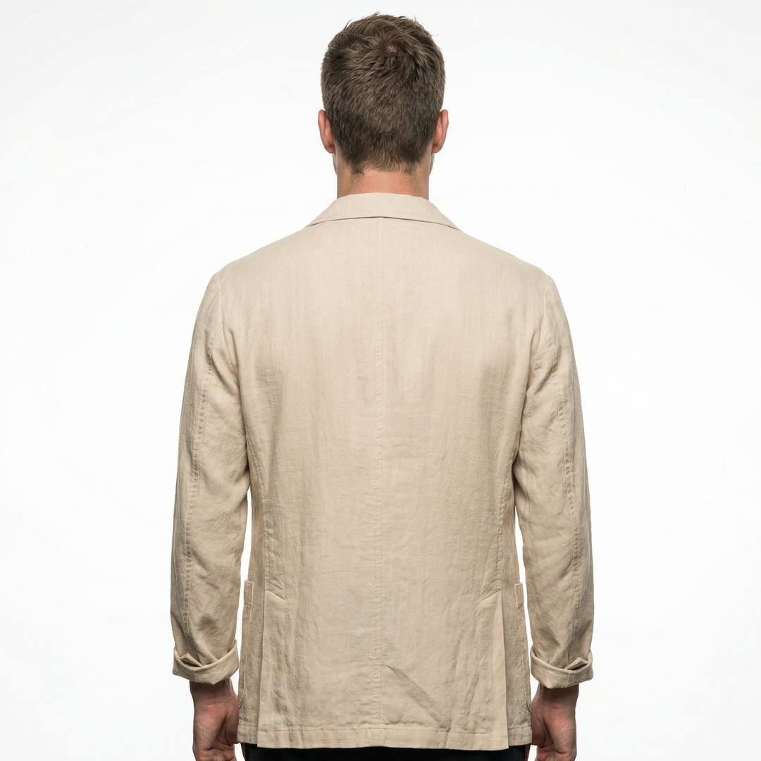 Close-up of linen fabric texture and button detail on men's blazer