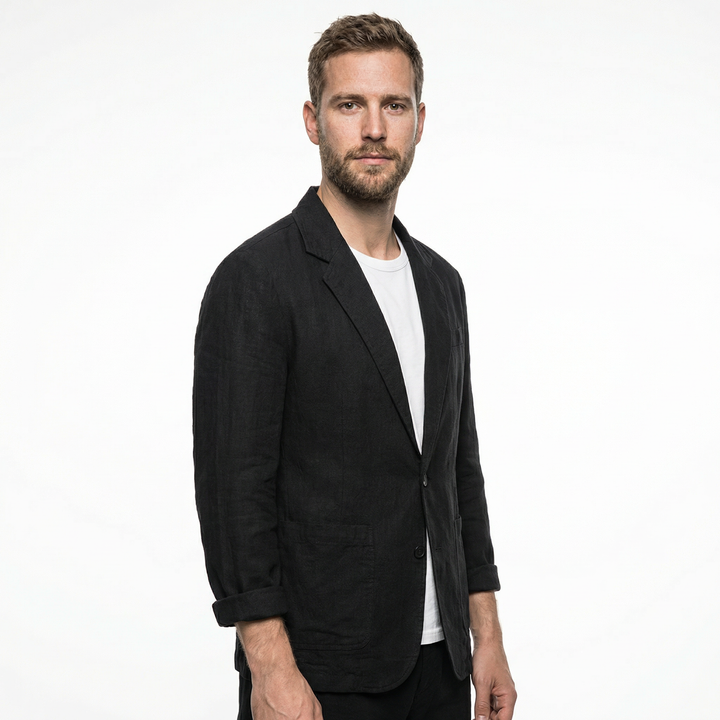 Detail view of collar and button closure on men's black linen blazer