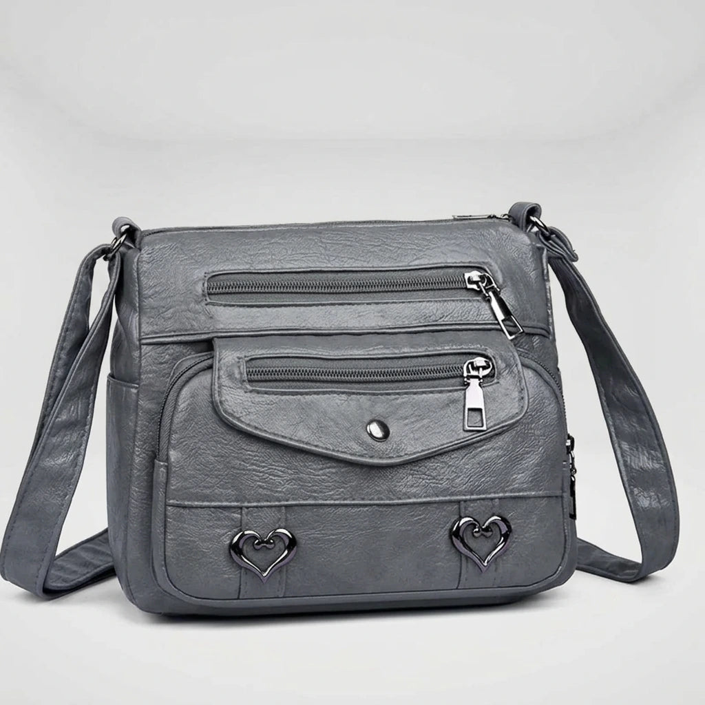 Women's structured shoulder bag in gray with gold hardware, front view