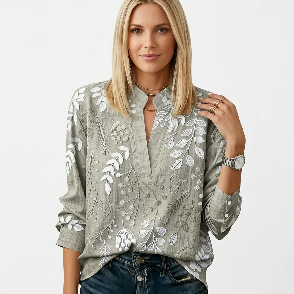 Women's botanical print blouse in sage green with V-split neckline, long sleeves, front view