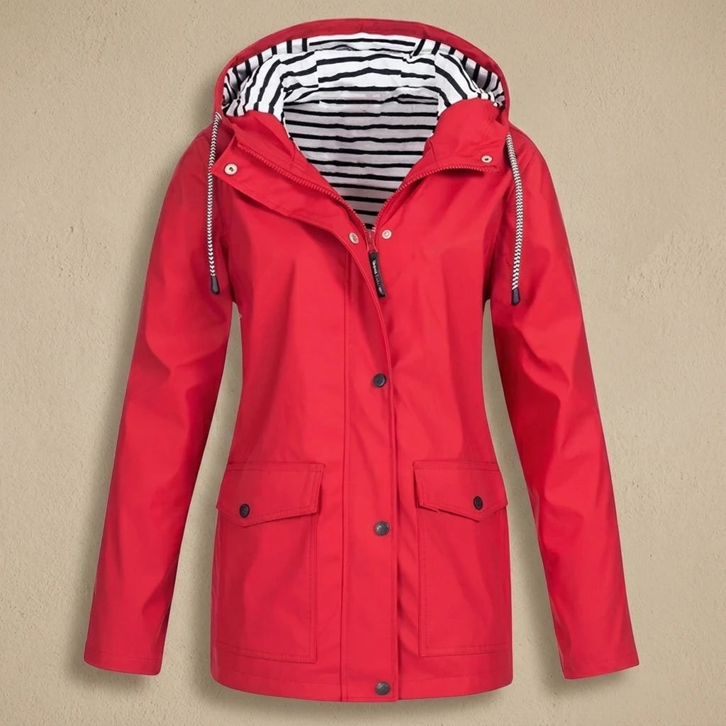 Interior lining of pink waterproof jacket showing taped seams and inner zip pocket