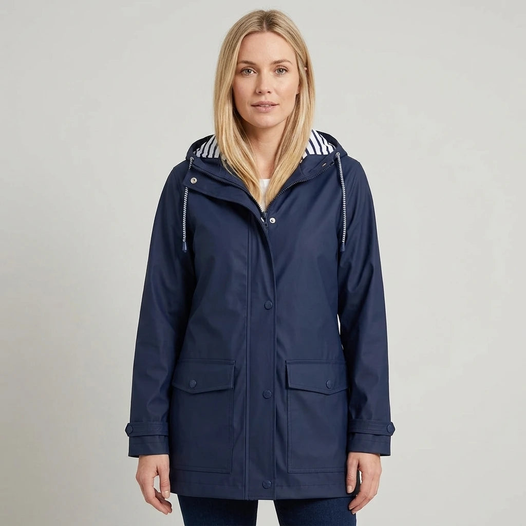 Women's insulated windbreaker in navy with color-block panels and drawstring hood, front view