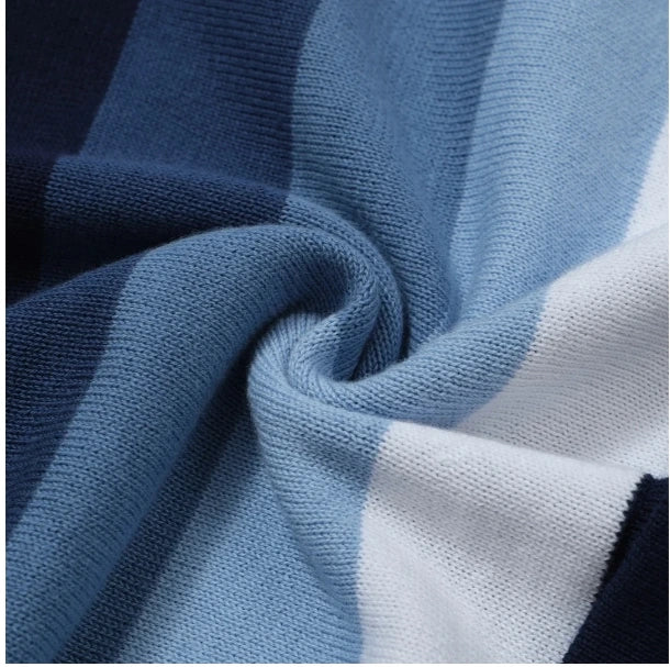 Macro fabric texture of gradient stripe knit polo in blue and white