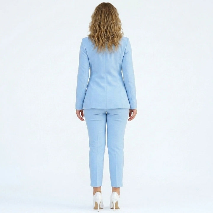 Full-length view of women's formal pant suit with straight-leg trousers