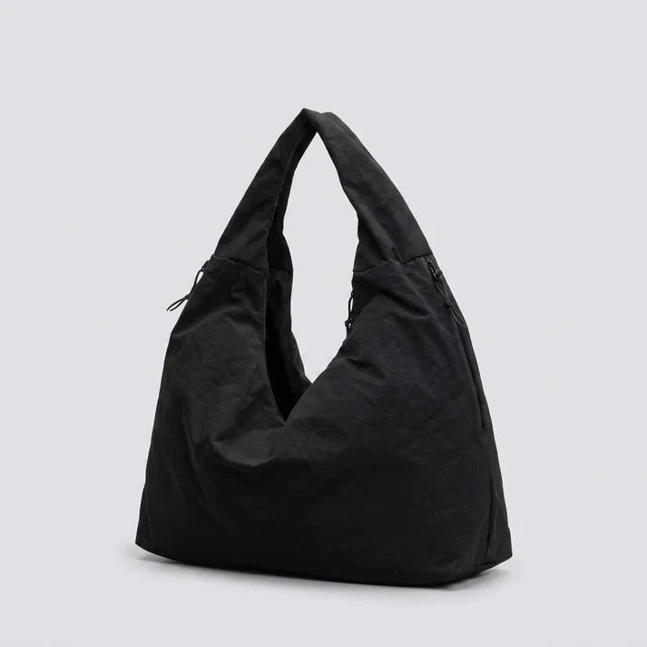 Nylon hobo bag interior pockets and polyester lining detail