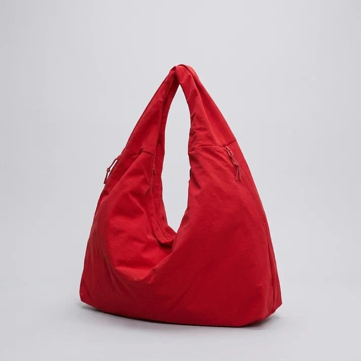 Large nylon hobo shoulder bag with zipper closure, flat lay main view