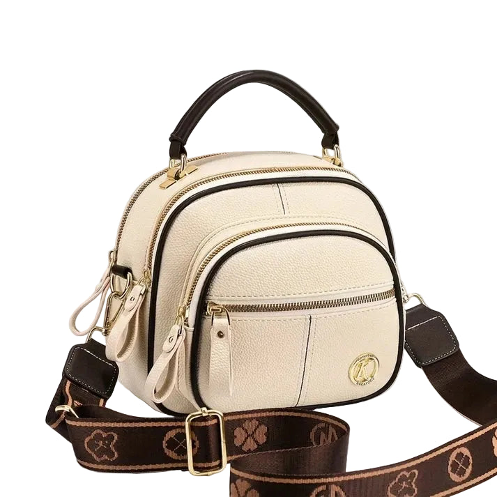 Compact crossbody bag with textured PU leather and zip closure, flat-lay view