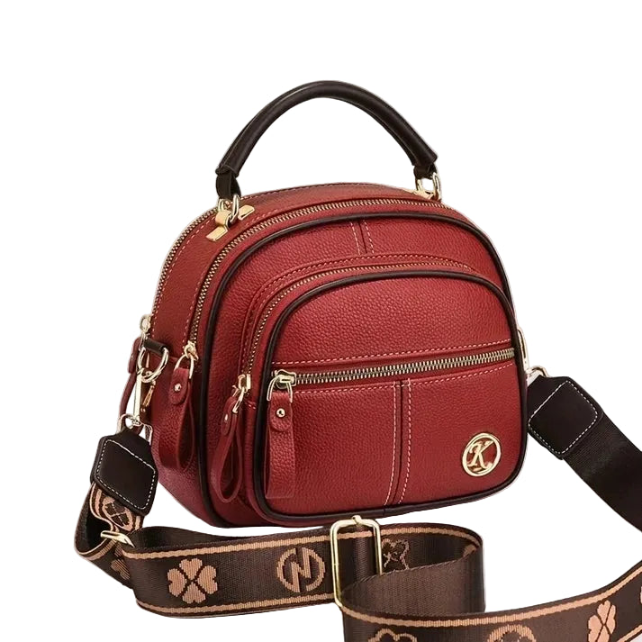 Small structured crossbody bag with adjustable shoulder strap, product view