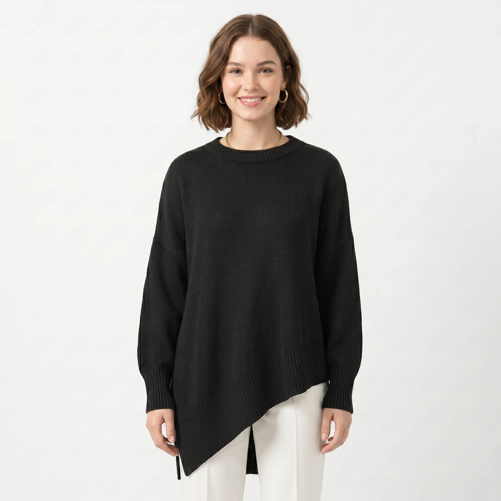 Oversized knit sweater with asymmetric tunic hem, side view