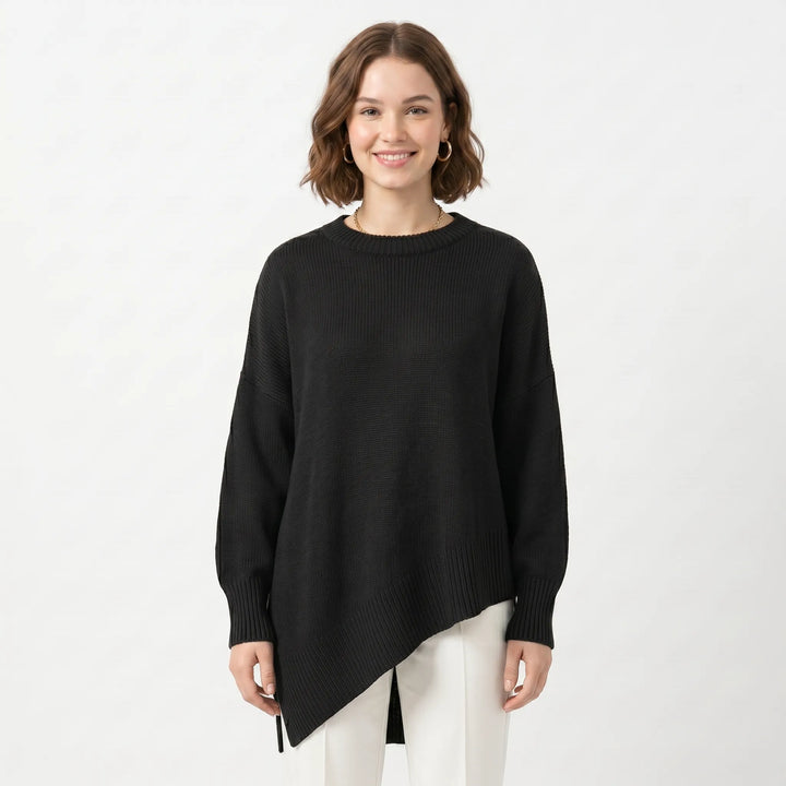Oversized knit sweater with asymmetric tunic hem, side view